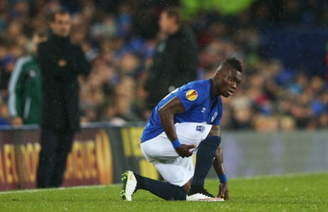 Christian Atsu holds his hamstring before being replaced by Kieran Dowell.