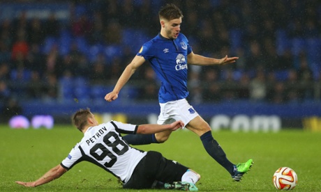 Luke Garbutt challenged by Sergei Petrov.