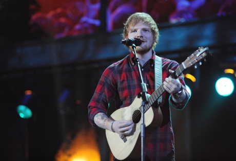 Ed Sheeran performs at the BBC Music awards at Earl's Court, London.