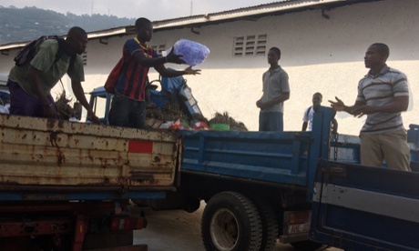 Loading the truck with water for the quarantined homes