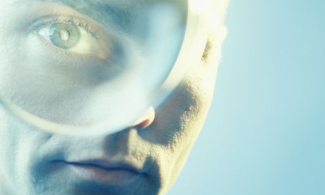 man magnifying glass