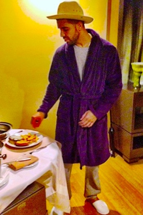 All in good taste? Drake eats his cheddar while wearing a wide-brimmed Panama hat.