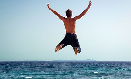 Man jumping into the sea