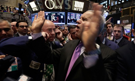 Traders on the floor of the New York Stock Exchange. Photo: AP/Richard Drew