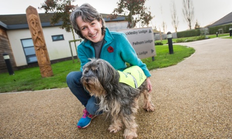 Marion Janner, founder of Star Wards, and her dog Buddy at Harrison House in Grimsby