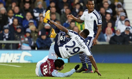 The Baggies player goes flying ...
