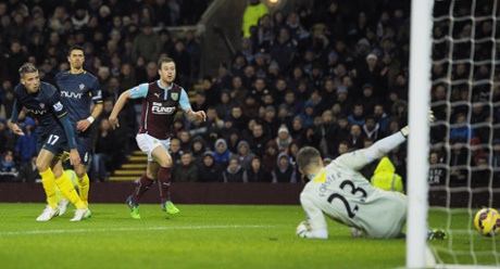 Ashley Barnes watches as his shot wrong foots Fraser Forster and squeezes between the keeper and the near post to give Burnley the lead.