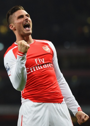 Giroud celebrates after scoring his second and Arsenal's third