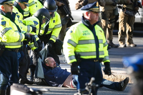 Police detain a protester in Boston