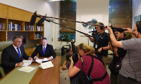 Treasurer Joe Hockey and the finance minister, Mathias Cormann, preparing to deliver Myefo at Parliament House in Canberra.