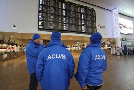 An electronic board displaying cancelled flights at the entrance to the check-in area of Brussels airport during a national strike in Brussels, Belgium, 15 December 2014.