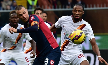 Roma's defender from France Mapou Yanga-Mbiwa  fights for the ball with Genoa's defender Luca Antonelli