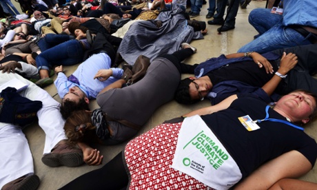 Acitivists demonstrate at the UN COP20 climate change conferences