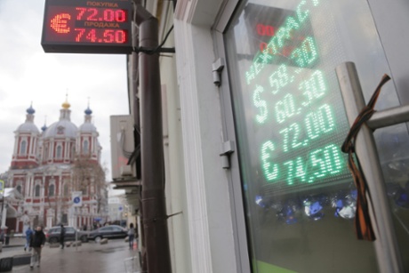 An electronic information panels displaying currency exchange rates in Moscow, Russia, 15 December 2014.