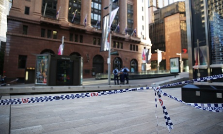 SYDNEY, AUSTRALIA - DECEMBER 16:  Police tape barricades off Martin Place on December 16, 2014 in Sydney, Australia.  The siege in Sydney's Lindt Cafe in Martin Place is over after 16 hours.  (Photo by Mark Metcalfe/Getty Images)ConflictWarTerrorism