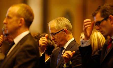 Australian Minister of Communications Malcolm Turnbull attends a mass to pay respect to the victims of the Martin Place siege.
