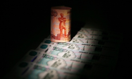 The rouble hit a new record low against the euro and dollar on Tuesday.