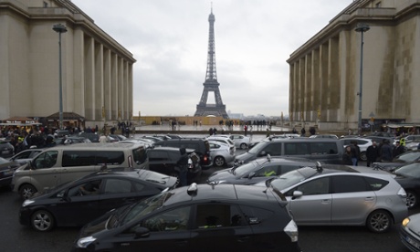 Taxi drivers participate in a 