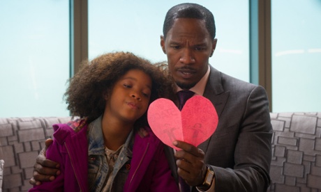Have a heart ... Quvenzhane Wallis as Annie, and Jamie Foxx as Will Stacks,