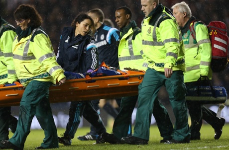 Chelsea's doctor Eva Carneiro talks to Kurt Zouma as the defender is stretchered off