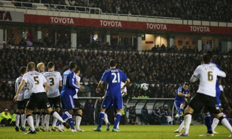 Filipe Luis fires a free kick goalward and it flies over the and curls into the top corner. Braziliant.