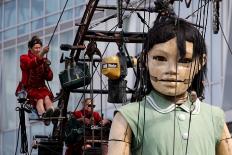 The Little Giant Girl walks through Liverpool as part of Liverpool's first world war centenary commemorations