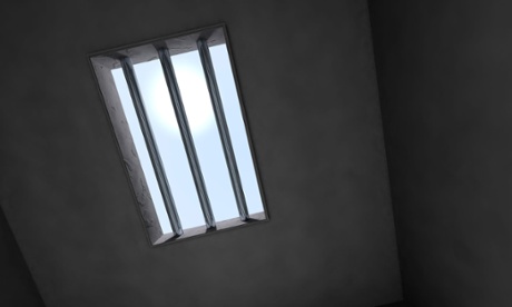 Jail cell bars across window