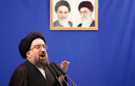 Iranian senior hard-line cleric Ayatollah Ahmad Khatami, delivers a Friday prayer sermon, under the pictures of late revolutionary founder Ayatollah Khomeini, left, and supreme leader Ayatollah Ali Khamenei, at the Tehran University campus in Tehran, Iran, Friday, June 26, 2009.