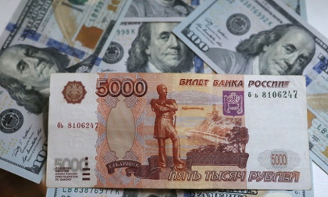 Russian rouble banknote and US dollars.