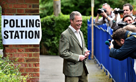 Nigel Farage poses for photographs