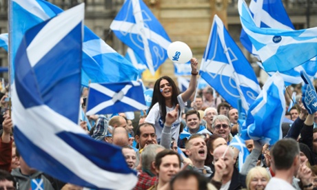 Campaigners wave Scottish Saltires at a ‘Yes’ campaign rally in Glasgow, Scotland September 17, 2014.