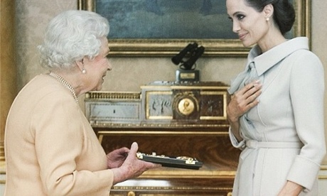 Angelina Jolie meets the Queen.