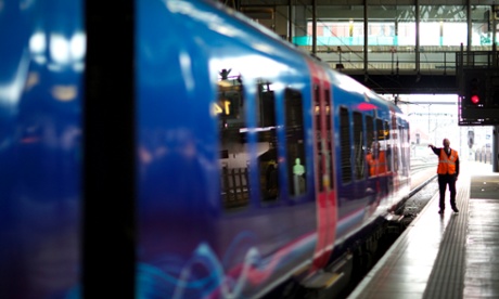 The 13.27 Transpennine Express service between Manchester and Leeds gets ready to depart from Victoria station.