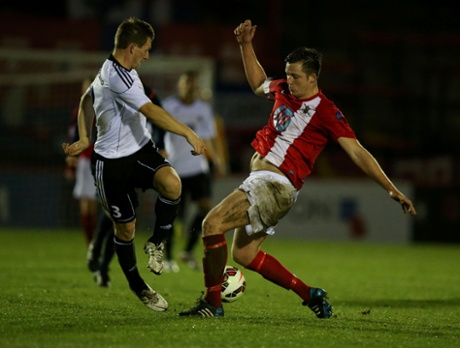 British army’s Calum Wilkinson and Bundeswehr’s Christian Freudenberg during the match.