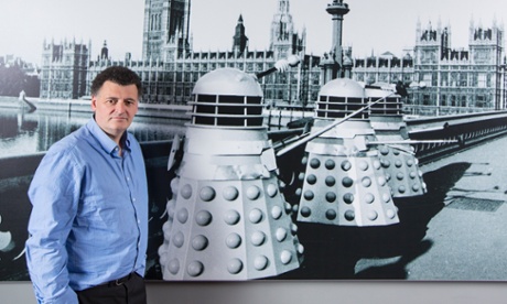 Steven Moffat with some Daleks.