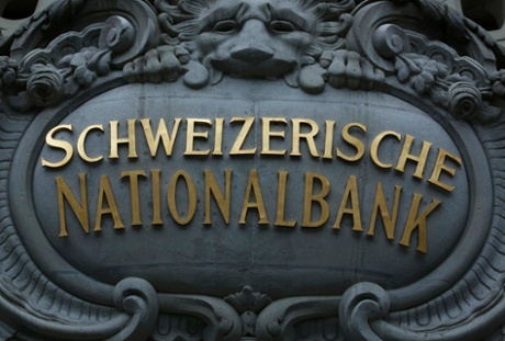 The logo of the Swiss National Bank (SNB) is seen at the entrance of the SNB in Bern December 18, 2014.
