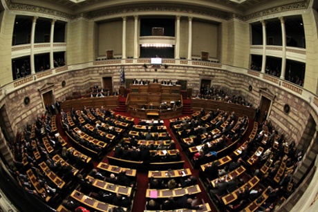 Lawmakers attend the first round of voting to elect a new president of the Hellenic Republic at the Parliament in Athens, Greece, Dec. 17, 2014.