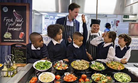 Nick Clegg joins some students for a school dinner