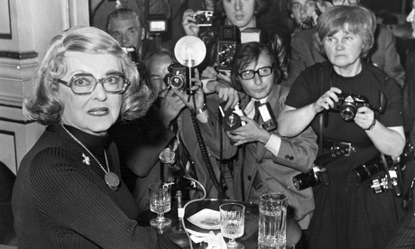 Jane Bown pushes to the front of a scrum of 'snappers' to photograph Bette Davis in London in 1975