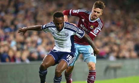 Jenkinson challenges West Brom's Saido Berahino during West Ham's win at the Hawthorns earlier this month.
