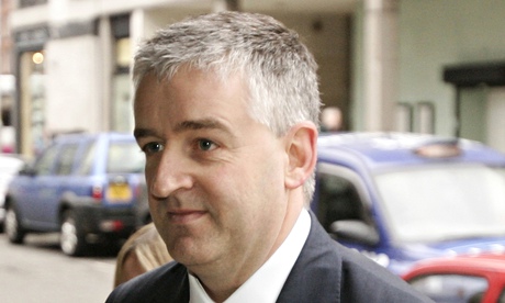 File photo of Sun Managing Editor Dudman arriving at the High Court in Manchester