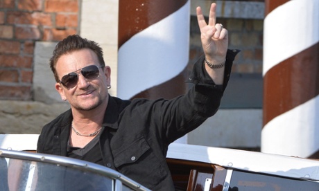Bono counting the number of people who actually wanted the US album on their iTunes account.