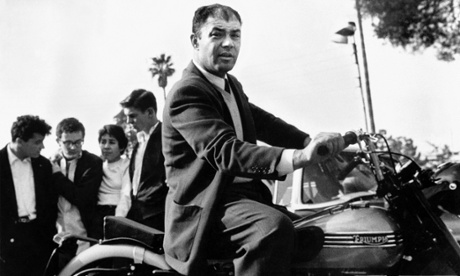 Phil Stern on James Dean's motorcycle, taken by Dean (1955).