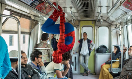 Spider-Man fails to get a seat on the Cairo metro.