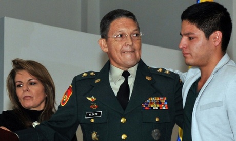 General Ruben Alzate with his wife, Claudia Farfan, and son during a press conference after his release by Farc rebels.