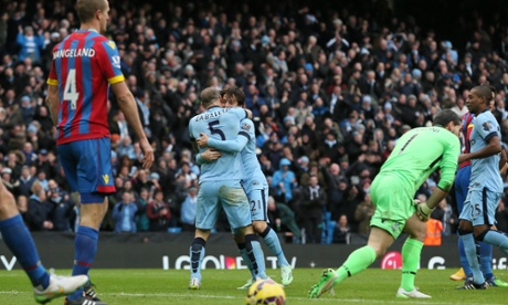 David Silva celebrates with Pablo Zabaleta after opening the scoring.
