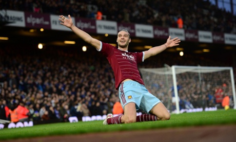 Ta-da! Andy Carroll looks chuffed about scoring with his feet.