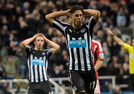 Perez holds his head after having his shot saved