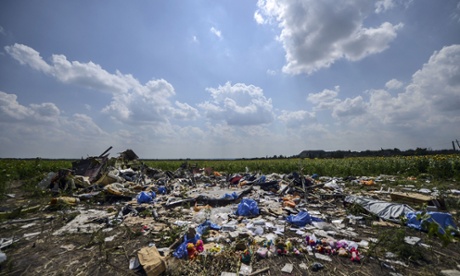 Wreckage and personal possessions at the site where Malaysia Airlines flight MH17 crashed in Ukraine.