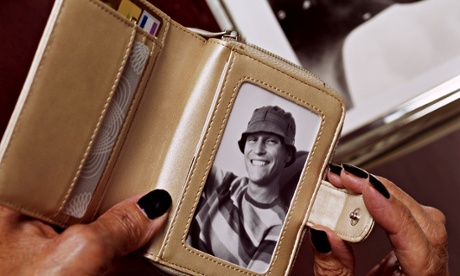 A woman holding a wallet